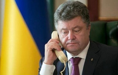 Порошенко пожаловался Меркель на Россию