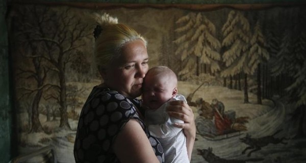 В  Донецке снаряд попал в жилой дом с женщиной и ребенком