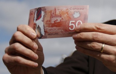 Канадский доллар продолжил падение и достиг минимума 2002 года