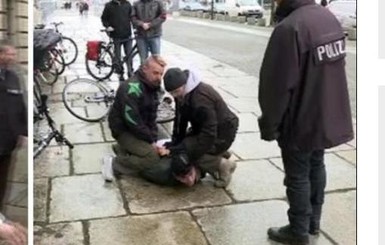 Фото: в Берлине на Меркель напал неизвестный, его задержала охрана